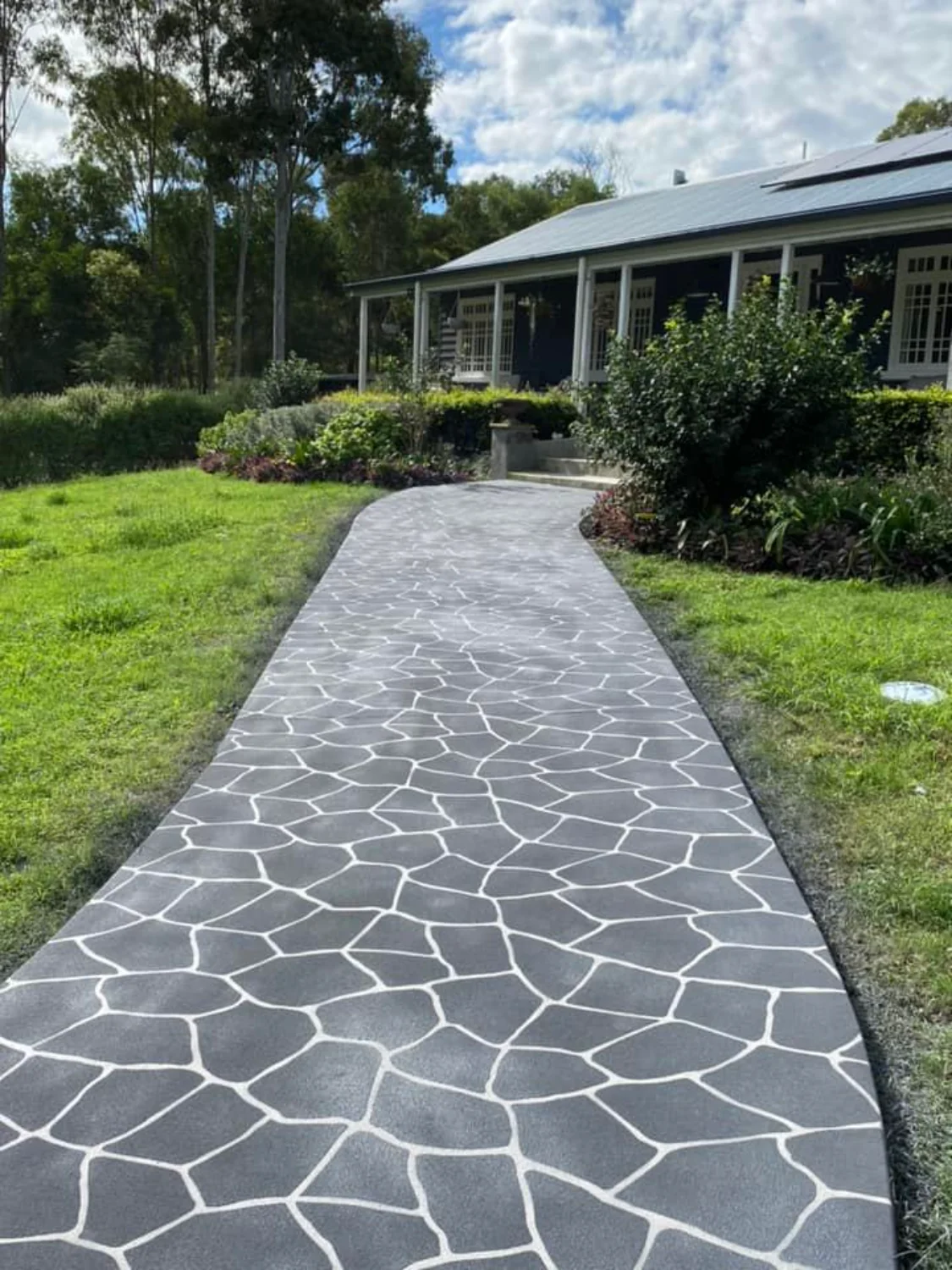 Decorative stencilled concrete footpath completed by Mark Holstein Concreting