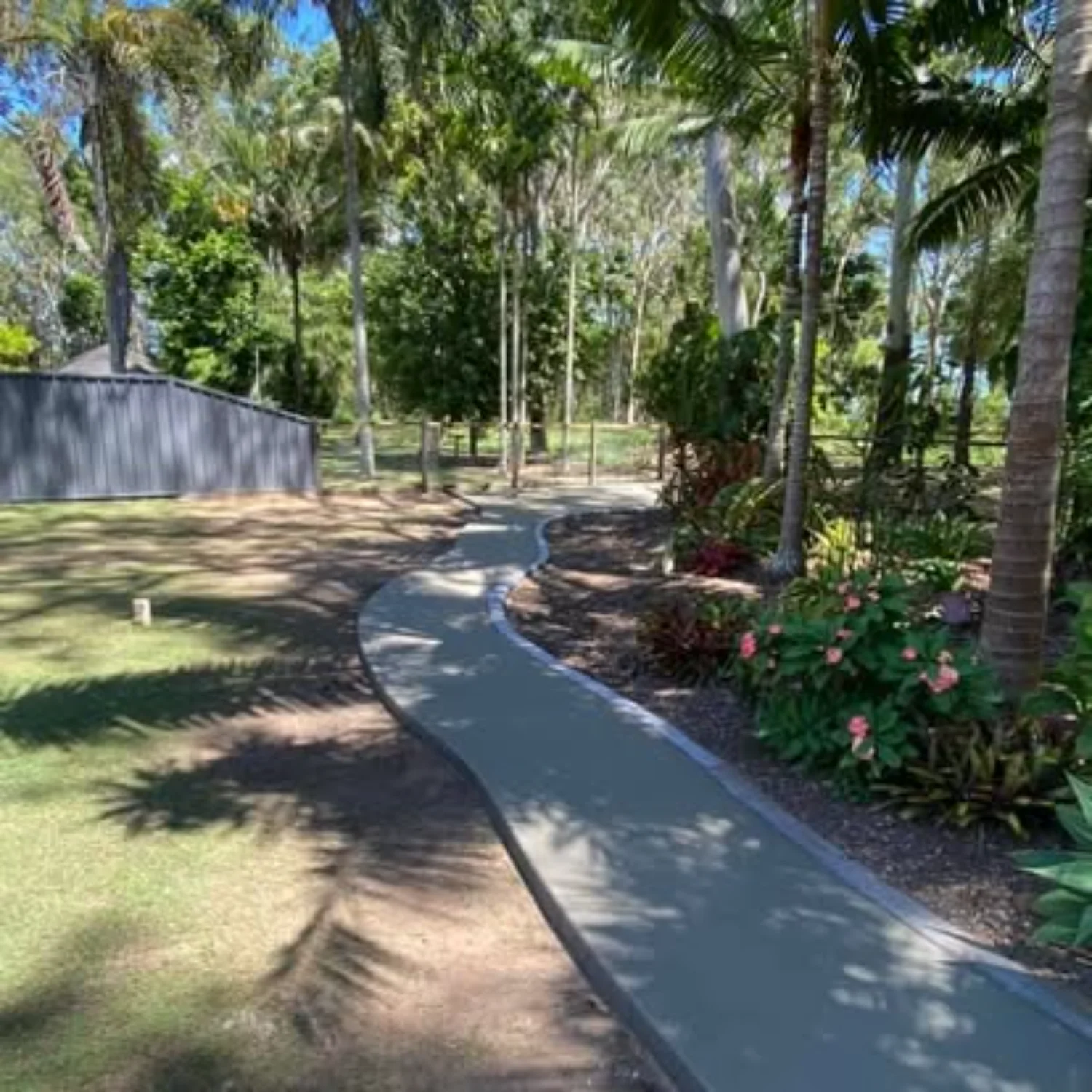 Concrete footpath extension connecting areas on a property in Hervey Bay, created by Mark Holstein Concreting
