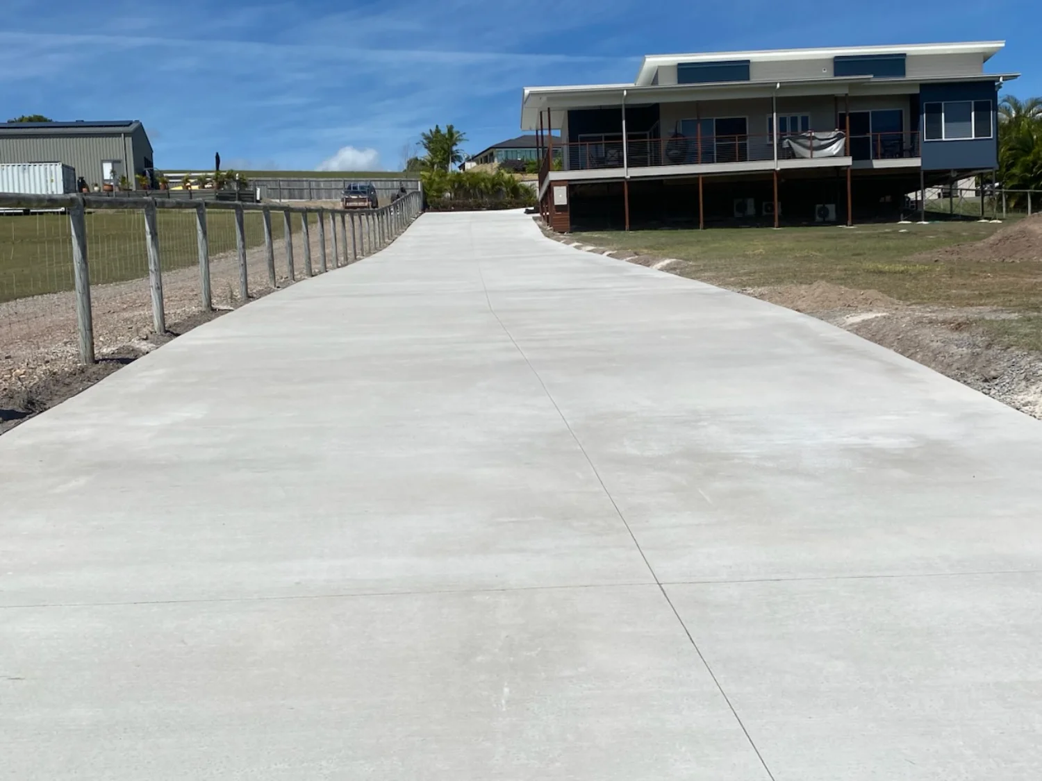 Completed large concrete driveway by the Mark Holstein Concreting team in Hervey Bay