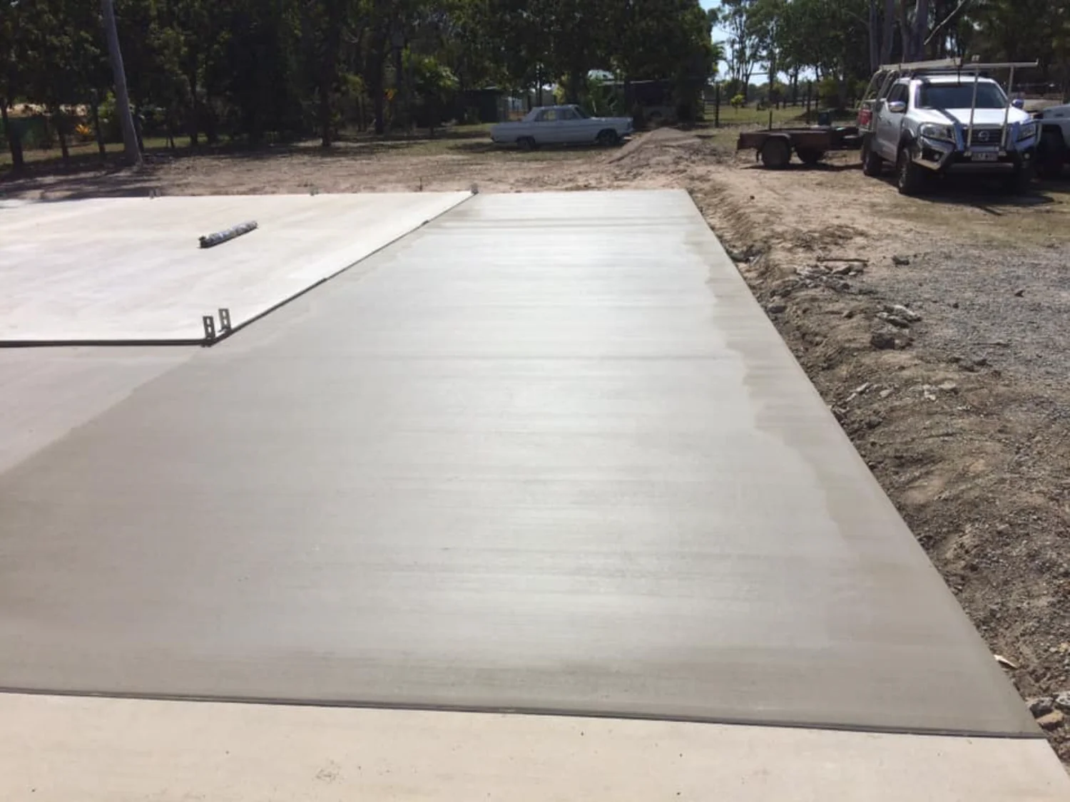 Concrete shed slab, freshly poured and levelled by the team at Mark Holstein Concreting team